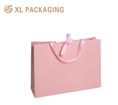 주문 럭셔리 분홍색 부티크 쇼핑용 종이 선물 가방 250G Gsm 자신의 로고 인쇄 손잡이와 함께 고판 포장 가방 online manufacture