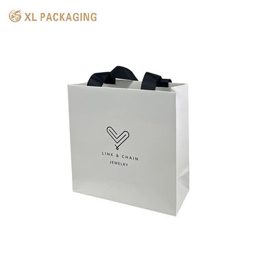 목재 리본 손잡이가있는 주문형 일회용 호텔 종이 쇼핑 가방